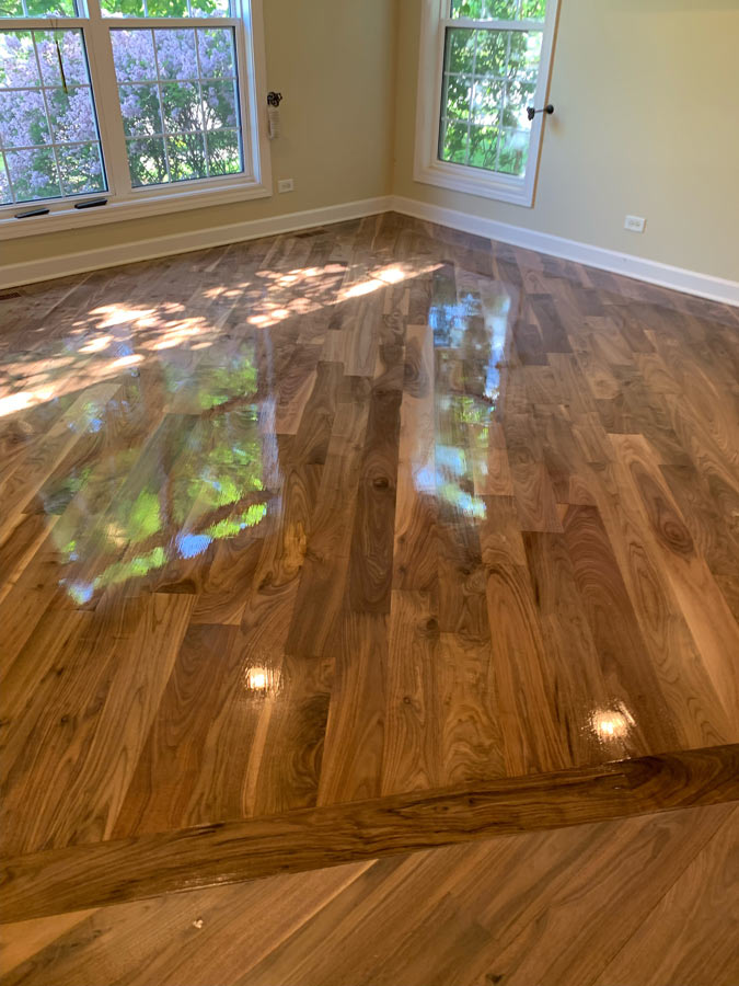 Restored hardwood floor in a dining room